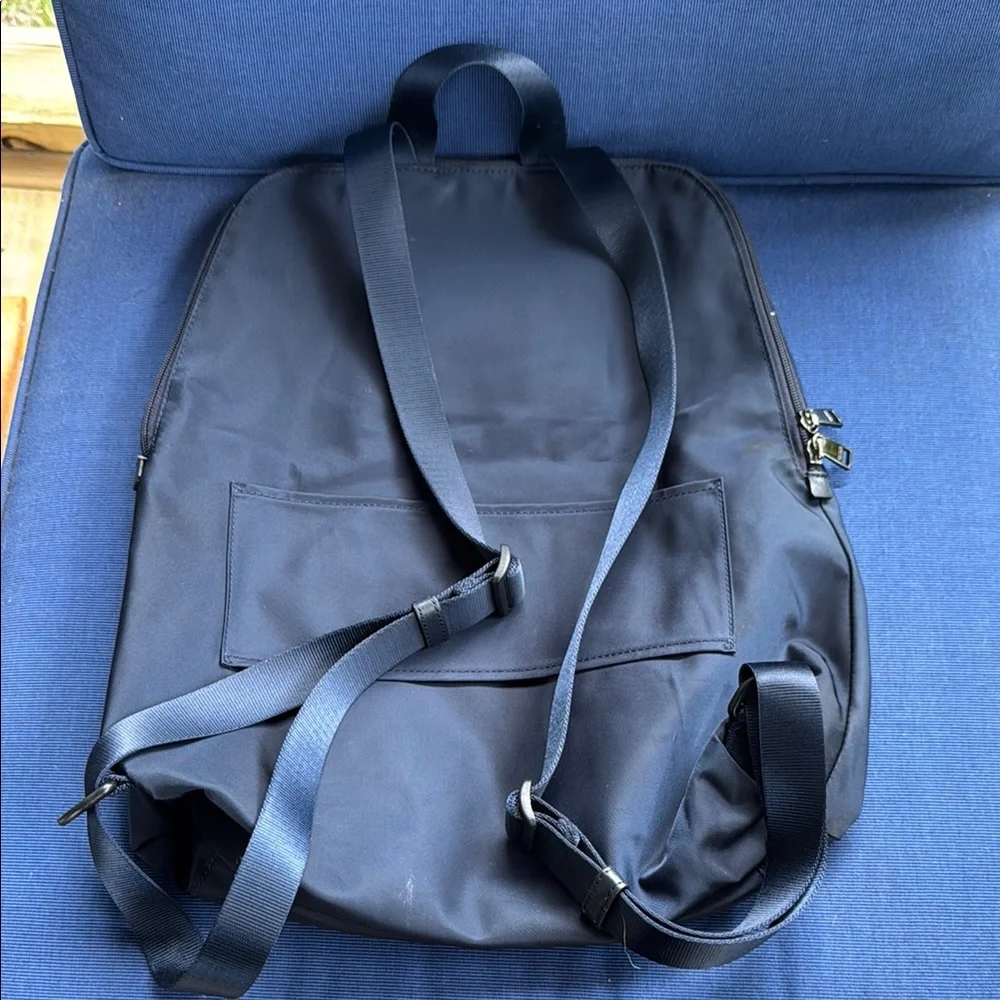 Tumi Black Backpack with Minimalist Design and Durable Material